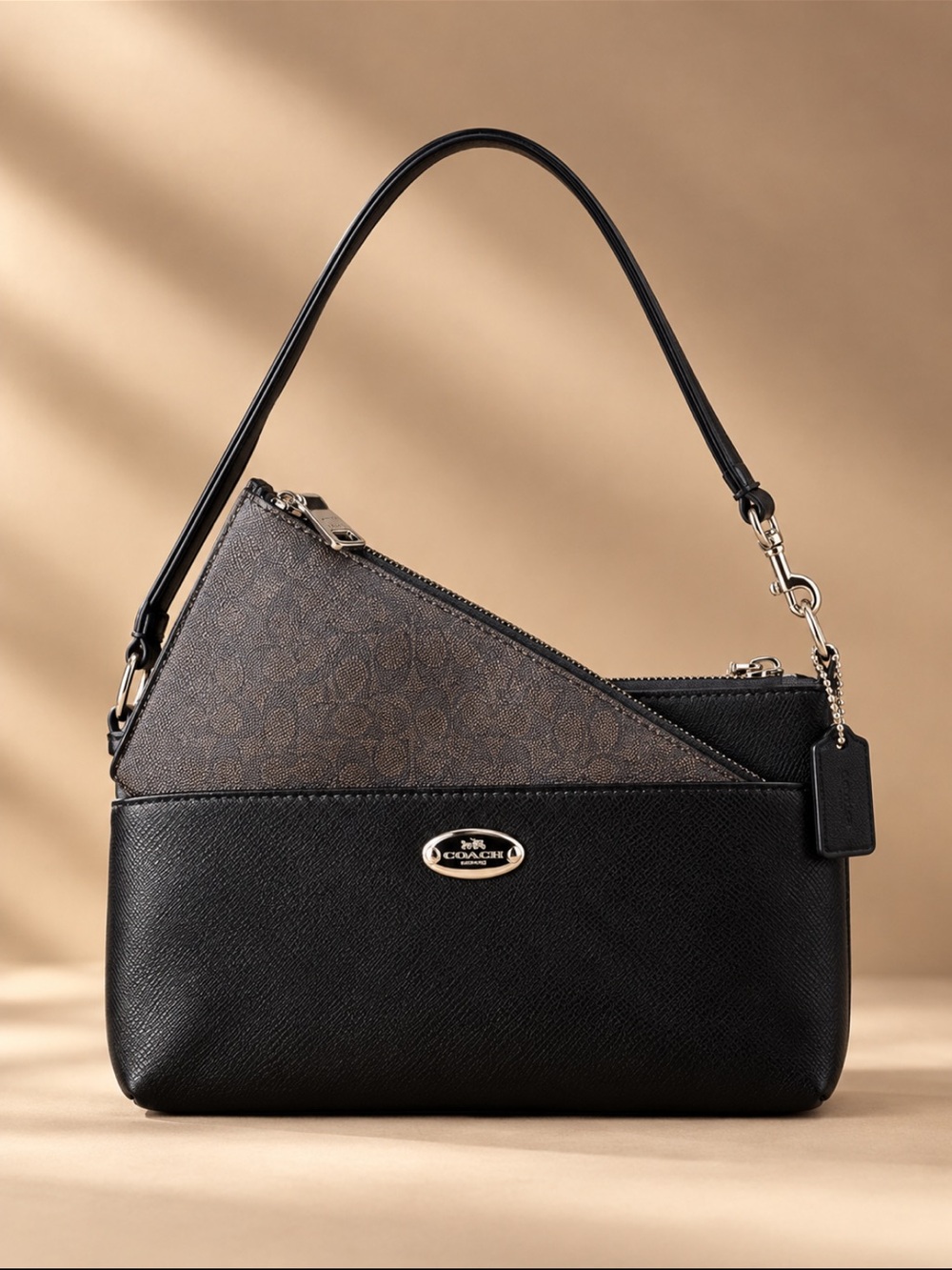 COACH Soft Pebble Leather Wristlet in Black